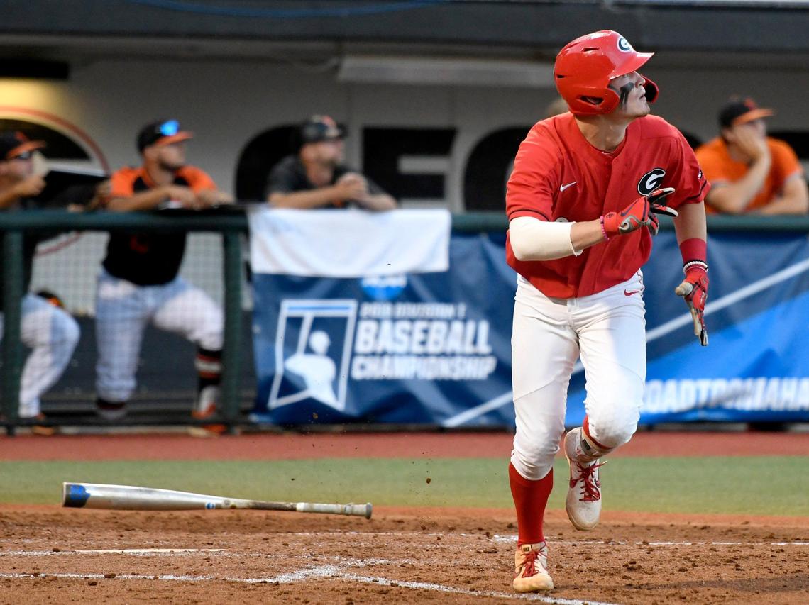 Georgia’s Aaron Schunk (22) watches his second home run of the game during the Bulldogs’ NCAA regional game against Mercer Friday night.