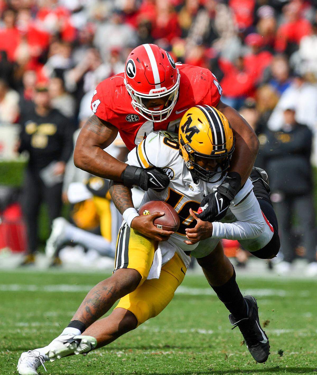Georgia defensive lineman Travon Walker sacks Missouri quarterback Tyler Macon in action Saturday as the Dawgs beat Missouri 43-6.