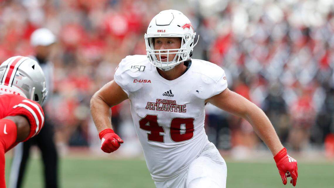 Florida Atlantic tight end Harrison Bryant, right, works against Ohio State safety Jeff Okudah during a 2019 game.