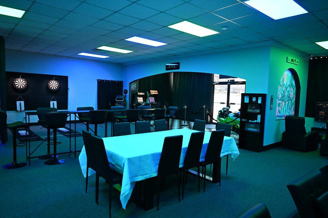 Various tables and seats are available around the televisions for video games, along with darts and arcade games at Disconnect Gaming Lounge gearing up to open in Warner Robins. Owners Jay Wilson and Adam Edwards plan to install two projectors above the table with the white tablecloth that will display game boards for tabletop gaming.
