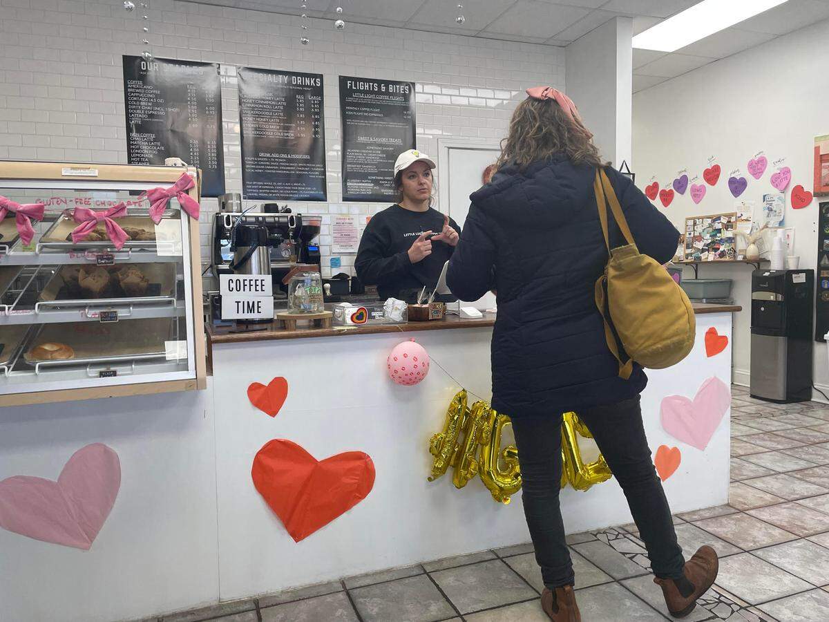 A customer places an order at Little Light Coffee Co. in Warner Robins.