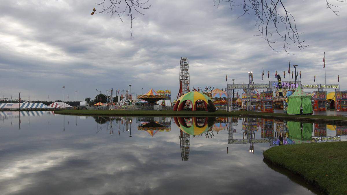 Attractions at the Georgia National Fair lay dormant before guests arrive on Saturday, October 10, 2015, in Perry, Georgia. The fair is located at the Georgia National Fairgrounds and Agricenter. 