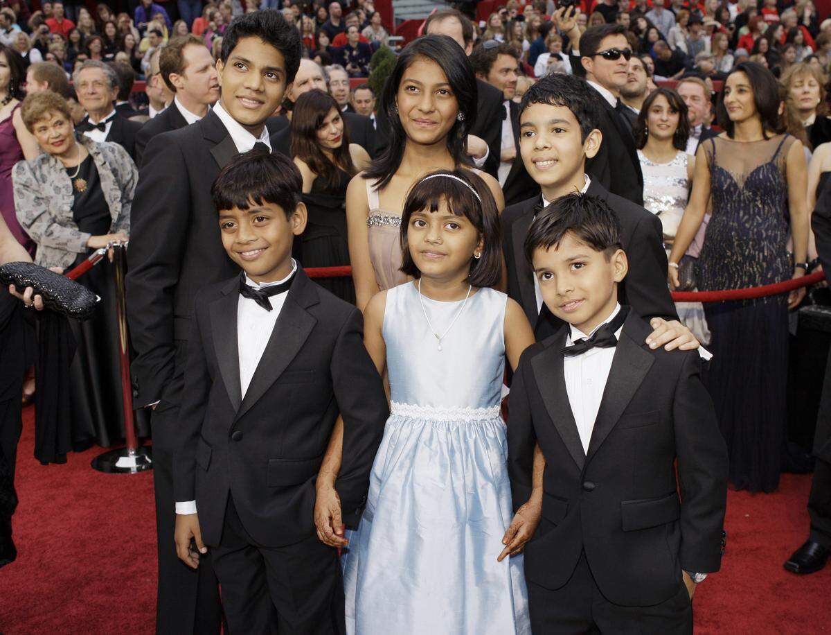 Young stars of "Slumdog Millionaire" arrive for the 81st Academy Awards in February 2009 in Los Angeles. From left front are Azharuddin Mohammed Ismail, Rubina Ali, and Ayush Mahesh Khedekar.  From left rear are Ashutosh Lobo Gajiwala, Tanvi Lonkar and Tanay Hemant Chheda. Lonkar is now a senior at Georgia College in Milledgeville.
