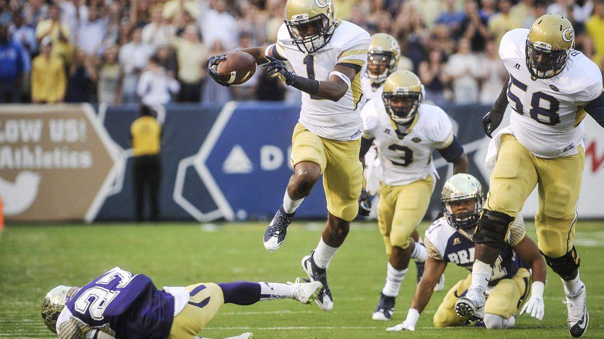 Georgia Tech running back and Lamar COunty product Qua Searcy (1) leaps over the defense of Alcorn State wide receiver Felando Warr during the first half of their Sept. 3 game in Atlanta.