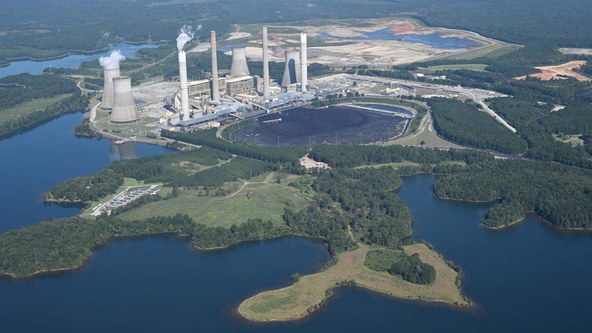 Lake Juliette surrounds the Georgia Power coal power plant Plant Scherer on Wednesday, Sept. 3, 2025, in Juliette, Georgia. Scientists point to coal-fired power plants like Plant Scherer as a source of mercury-consumption advisories in local fish.