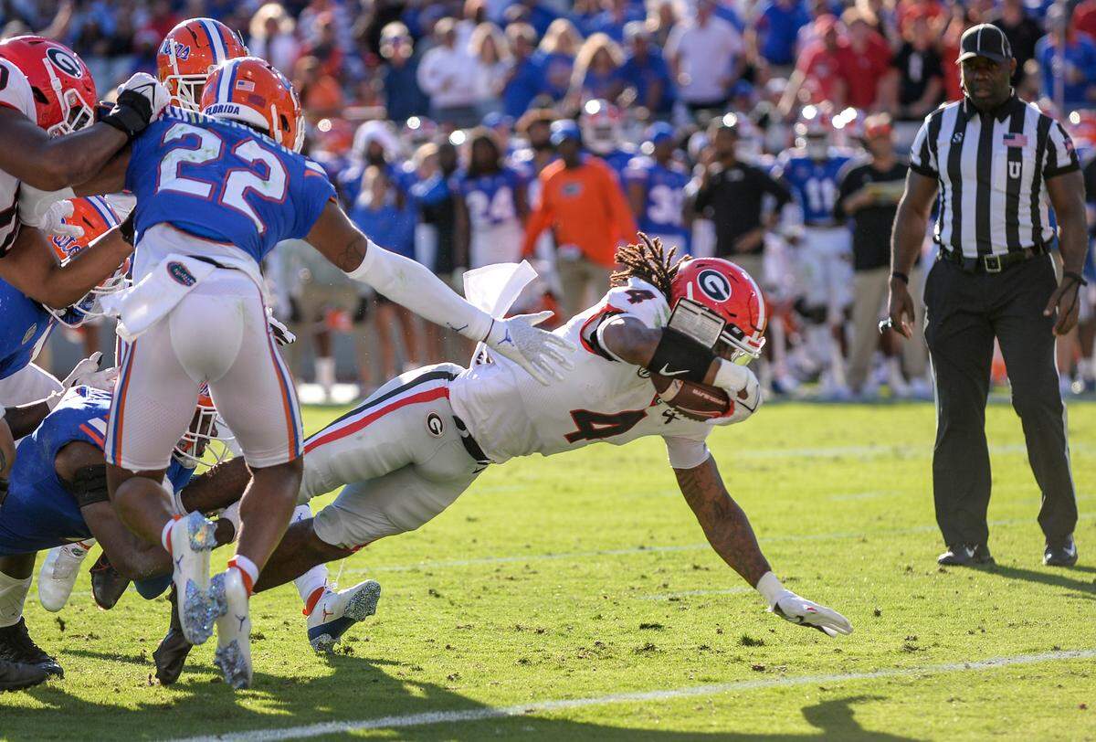 DONN RODENROTH,Jacksonville, Florida, 10/30/2021: James Cook in for a Georgia touchdown.