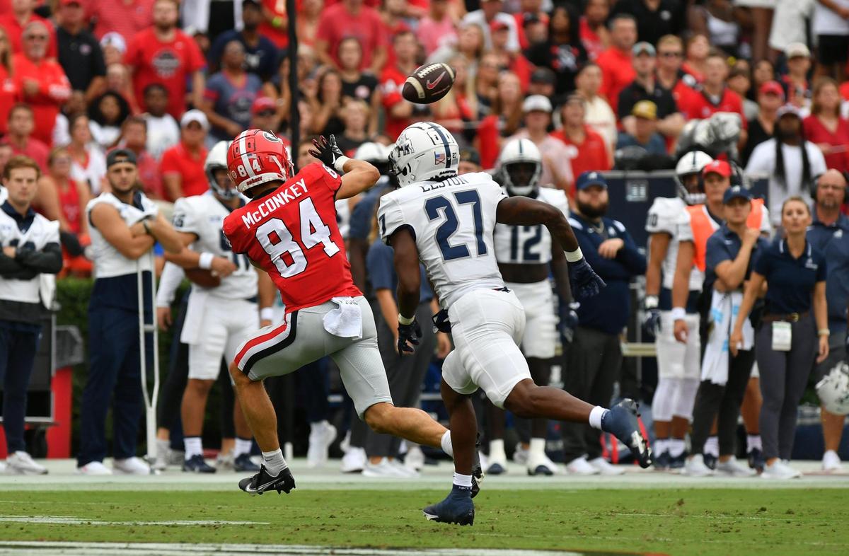 Georgia receiver Ladd McConkey (84) hauls in a reception for first down during the Bulldogs’ 33-0 win over Samford Saturday in Athens.