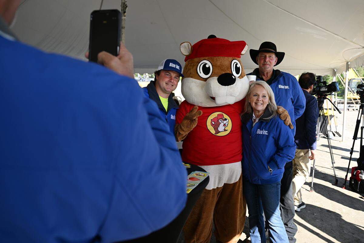Representatives from Blue Inc. Construction Group pose with Buc-ee’s mascot Bucky the Beaver ahead of the Monroe County Buc-ee’s groundbreaking on Tuesday, April 7, 2026, in Forsyth, Ga. The fourth Buc-ee’s location in Georgia will be located off of I-75 South in Monroe County and is expected to open in the next 14 to 16 months.