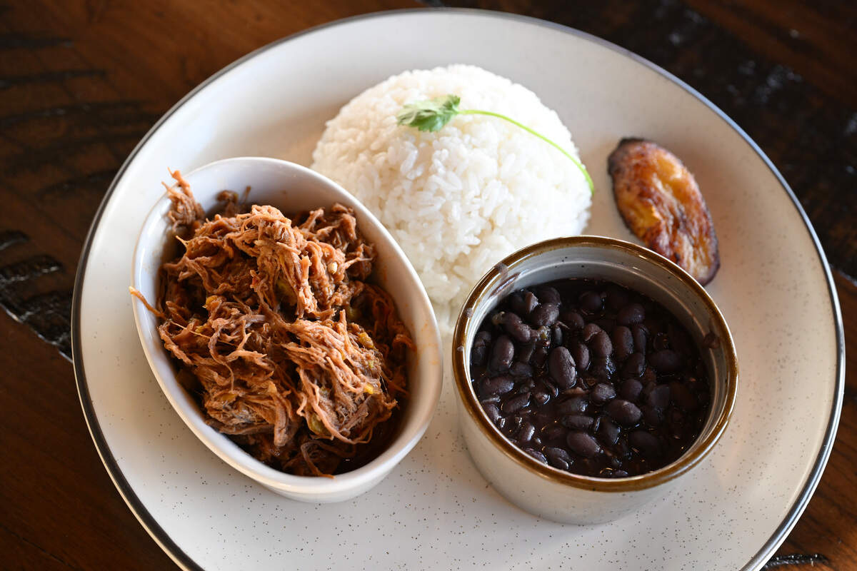 Ropa vieja from Vida Latin Kitchen is served with two sides, pictured here with white rice, black beans and a plantain. The traditional Cuban dish is a recipe adapted from owner Paula Aguirre’s family.