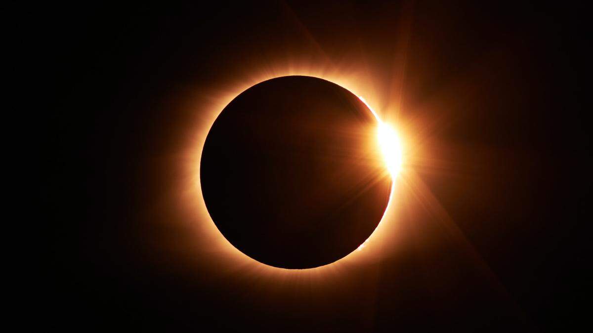 During the annular solar eclipse, the moon appears to be smaller than the sun, leaving a “ring of fire.”