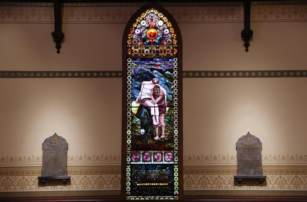 A stained glass window depicting the “Parable of the Good Samaritan” created by Louis Comfort Tiffany, of Tiffany & Co., sits inside of Christ Church on Tuesday, Feb. 25, 2025, in Macon, Georgia. In 1883, the Tiffany window was the first to be installed outside of the northeast U.S. and continues to attract people to Christ Church to this day.