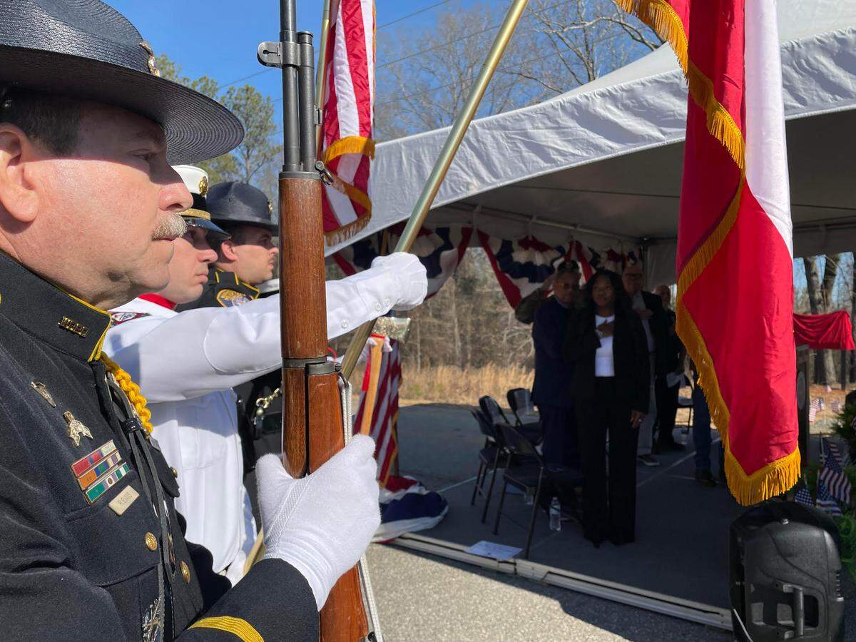 The joint honor guard of the Warner Robins police and fire departments post the colors at Friday’s land tribute event for the future home of a Vietnam Veterans Memorial in Warner Robins.