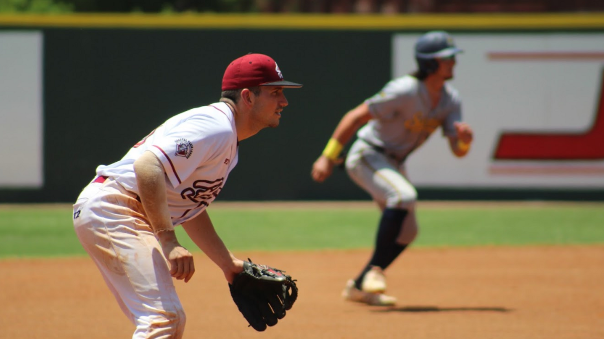 UGA baseball player Riley King faces off against an opponent while playing for the Macon Bacon.
