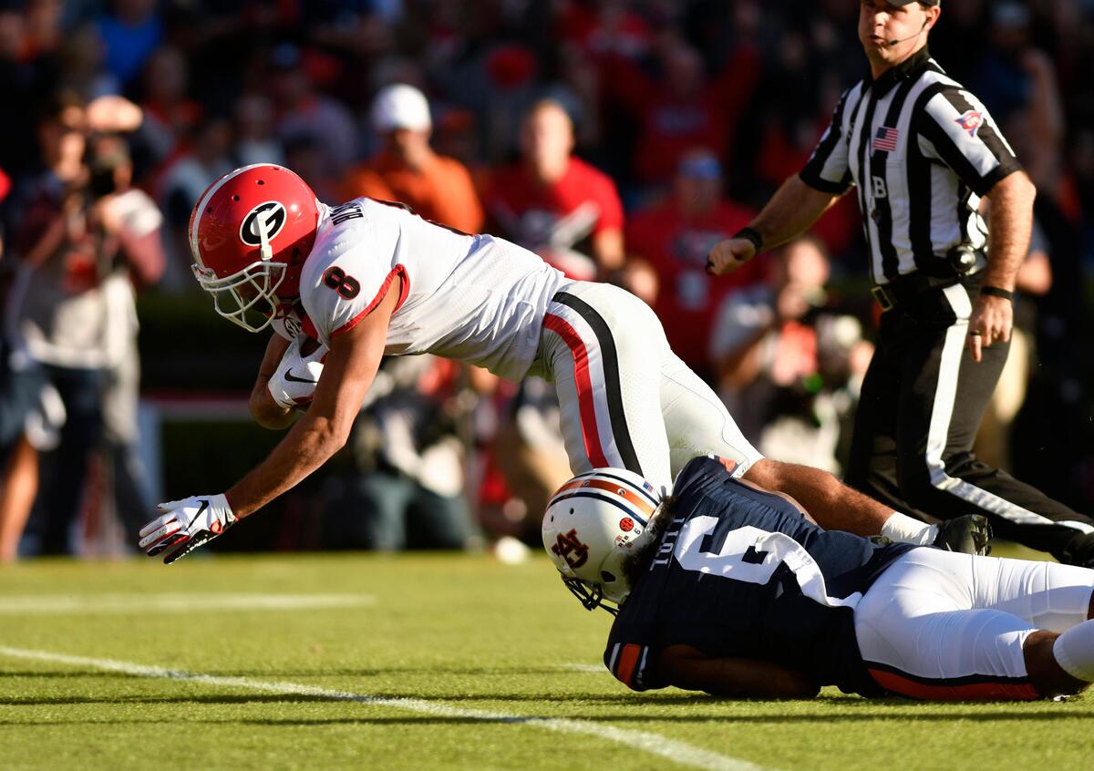 Georgia wide receiver Dominick Blaylock lunges for the endzone to score the first touchdown of the day in the Dawgs match-up with Auburn.