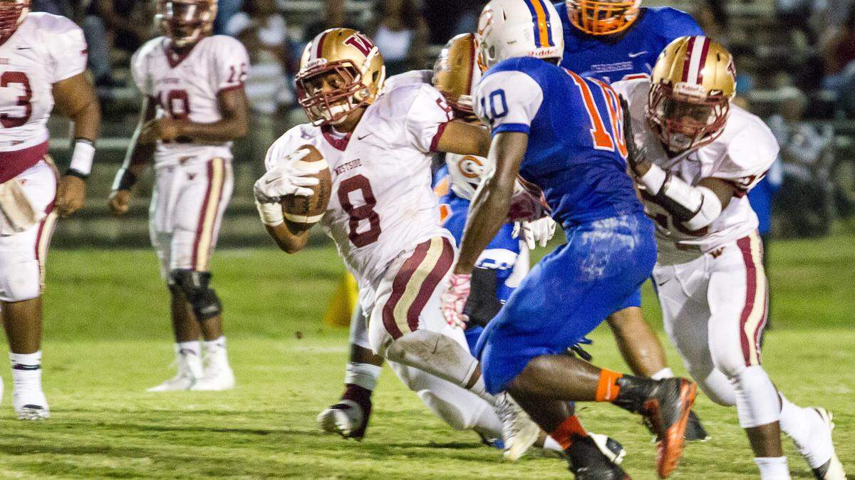 Westside’s Nygel Woodard running to daylight in the first half of the Seminoles’ GHSA Region 2-AAA matchup Sept. 18 against Central.