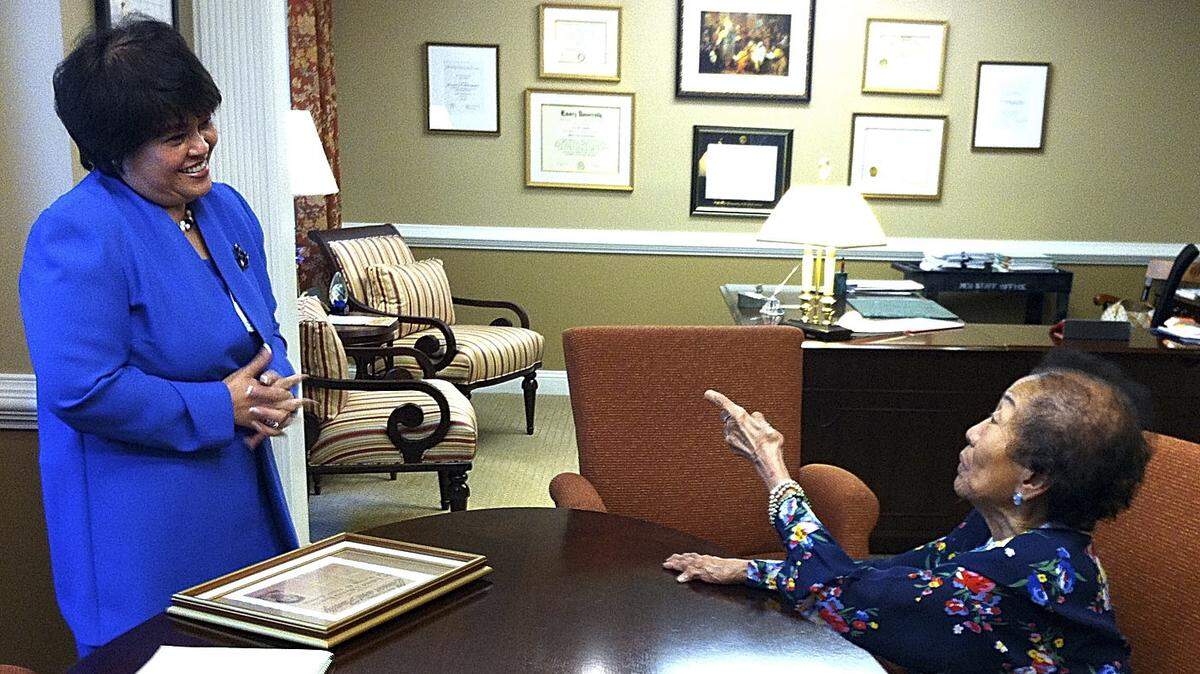 Dr. Lolita Garcia Rutland, right, meets with Dr. Ninfa Saunders, CEO of The Medical Center of Central Georgia (now Medical Center, Navicent Health), in this 2014 file photo.