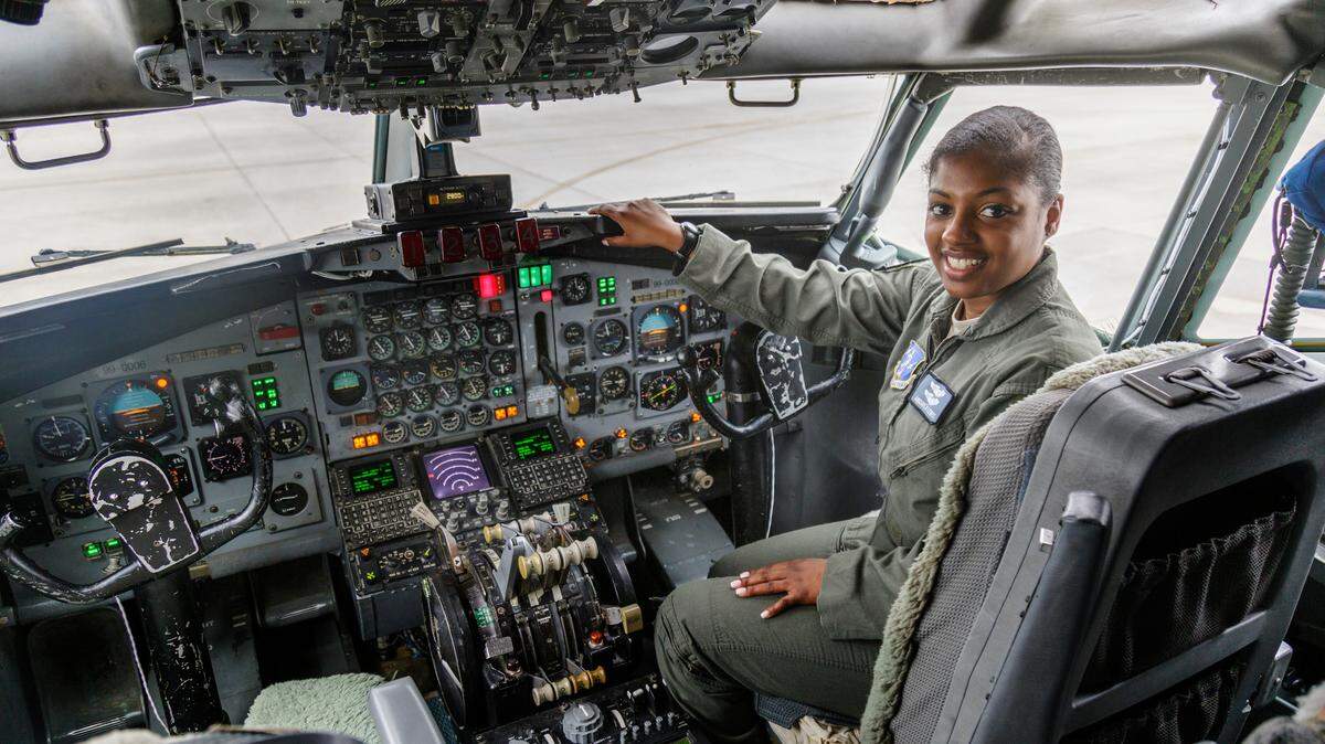 1st Lt. Andrea Lewis, the first black female pilot in the history of the Georgia Air National Guard, sits in the cockpit of a E-8C J-STARS jet at Robins Air Force Base on Wednesday.