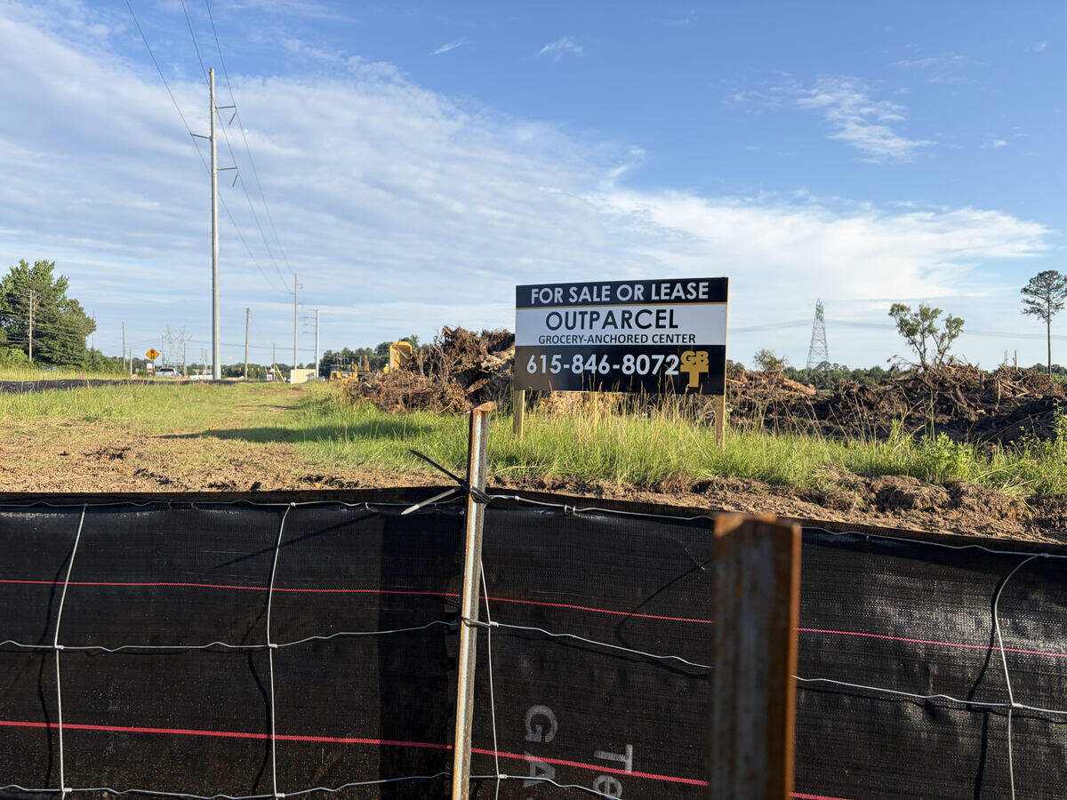 A side view of the Sprouts Farmers Market development off South Houston Lake Road near a Flint Energies electric transformer station. Site preparation work also is underway for Sprouts with a sign posted on site that the four outparcels on the property are pre-leasing.