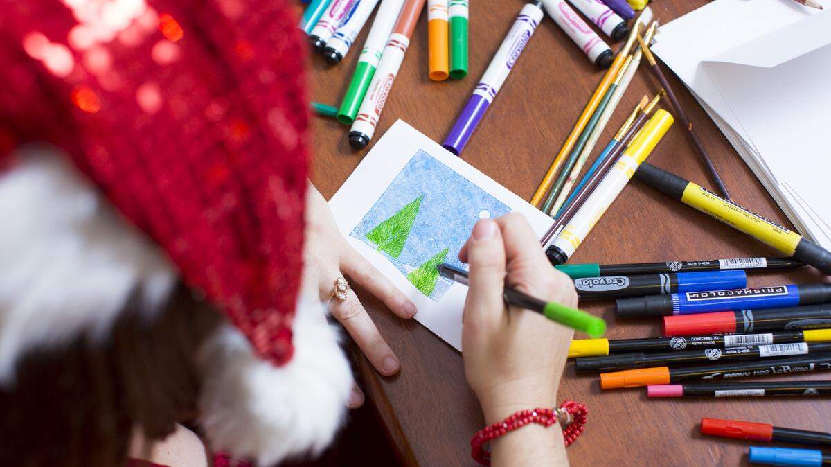 Sadie Dingfedler makes her own cards for the holidays by hand and even designs them digitally for friends and family.