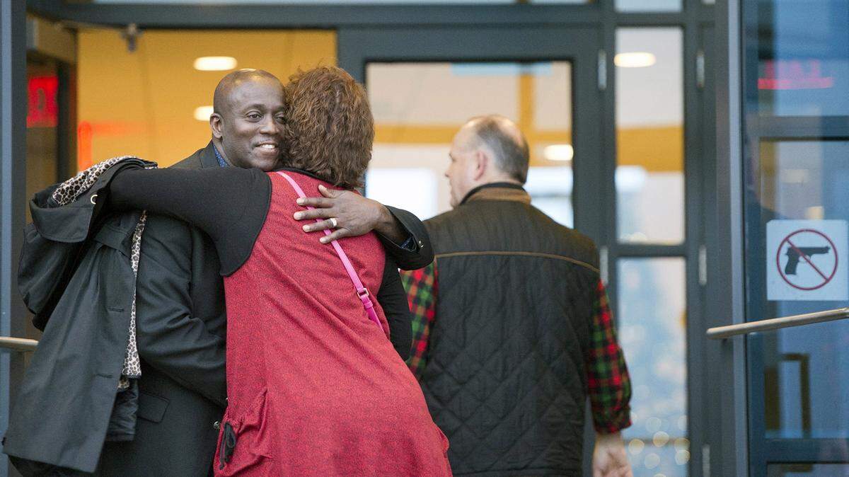 On a recent Saturday afternoon, Darryl A. Burton, 54, an associate pastor, greets guests for worship at Church of the Resurrection in Leawood, Kan. (Tammy Ljungblad/Kansas City Star/TNS)