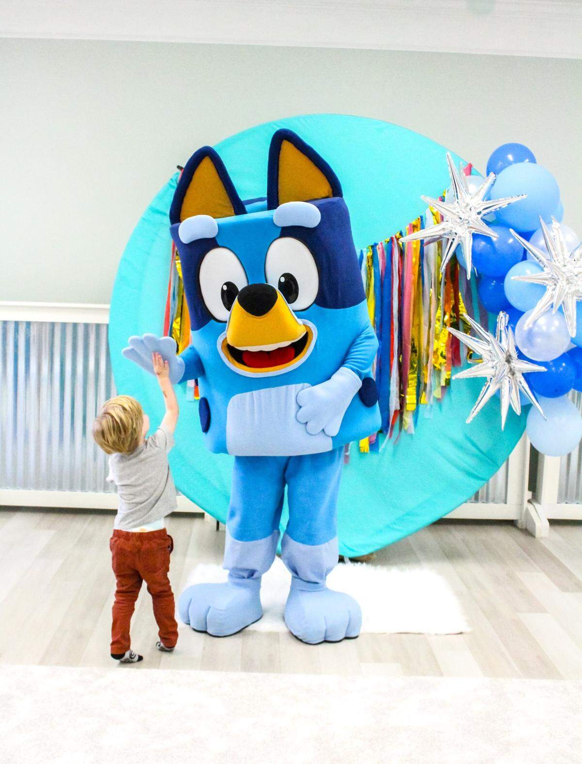 Bluey, played by a Dream A Little Wish Entertainment performer, visits Peachy Playtown in Perry and meets one of her biggest fans. The business started in September 2020 and serves the Middle Georgia area.