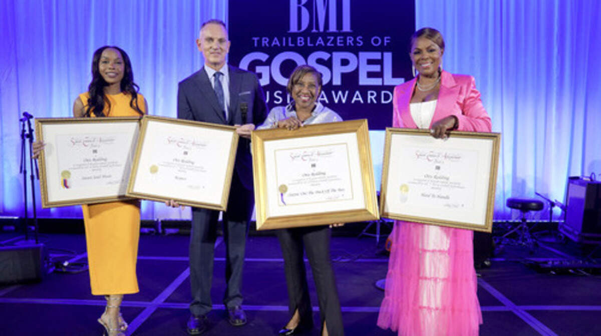 Karla Redding-Andrews (pictured second from right) poses with Million-Air awards granted to her father, Otis Redding, along with BMI leaders and organizers during 2023 BMI Trailblazers of Gospel Music Awards.