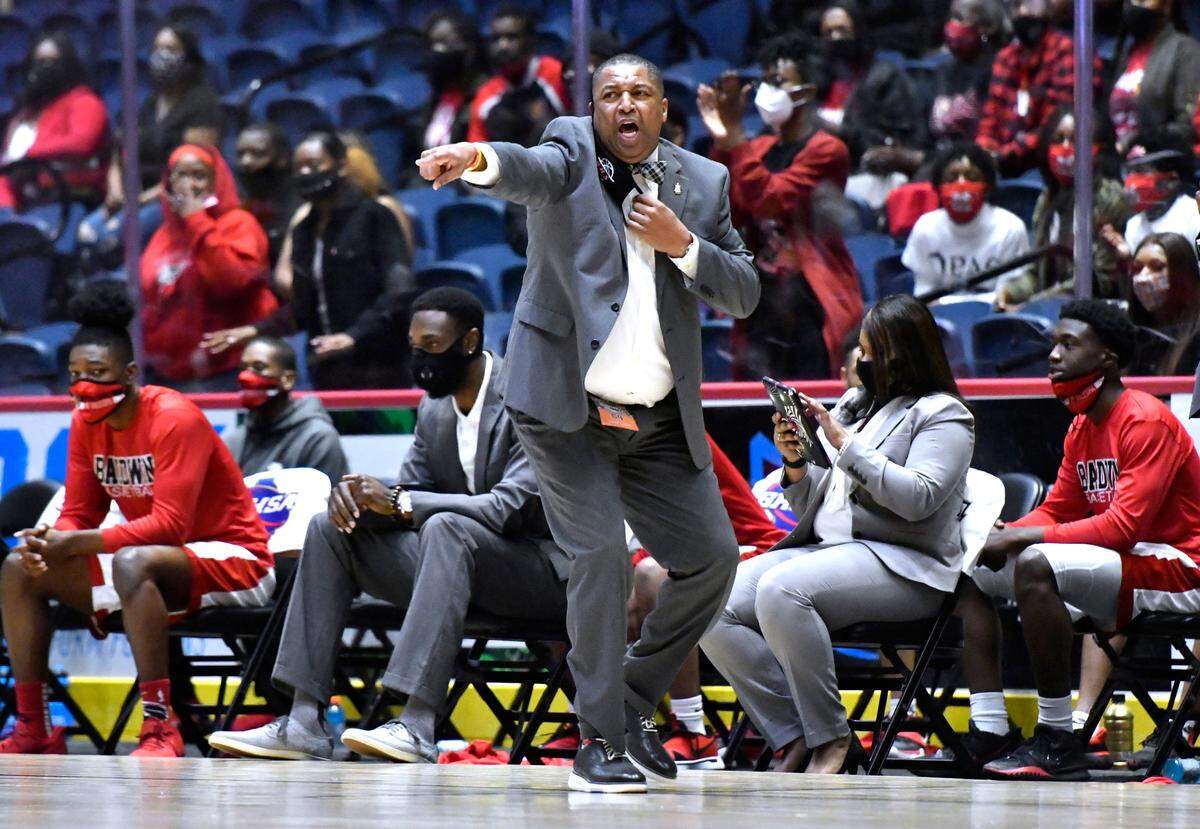 Baldwin head coach Anthony Webb yells instructions from the bench during the BravesÕ GHSA 4A State Championship game against Fayette County Wednesday night in Macon.