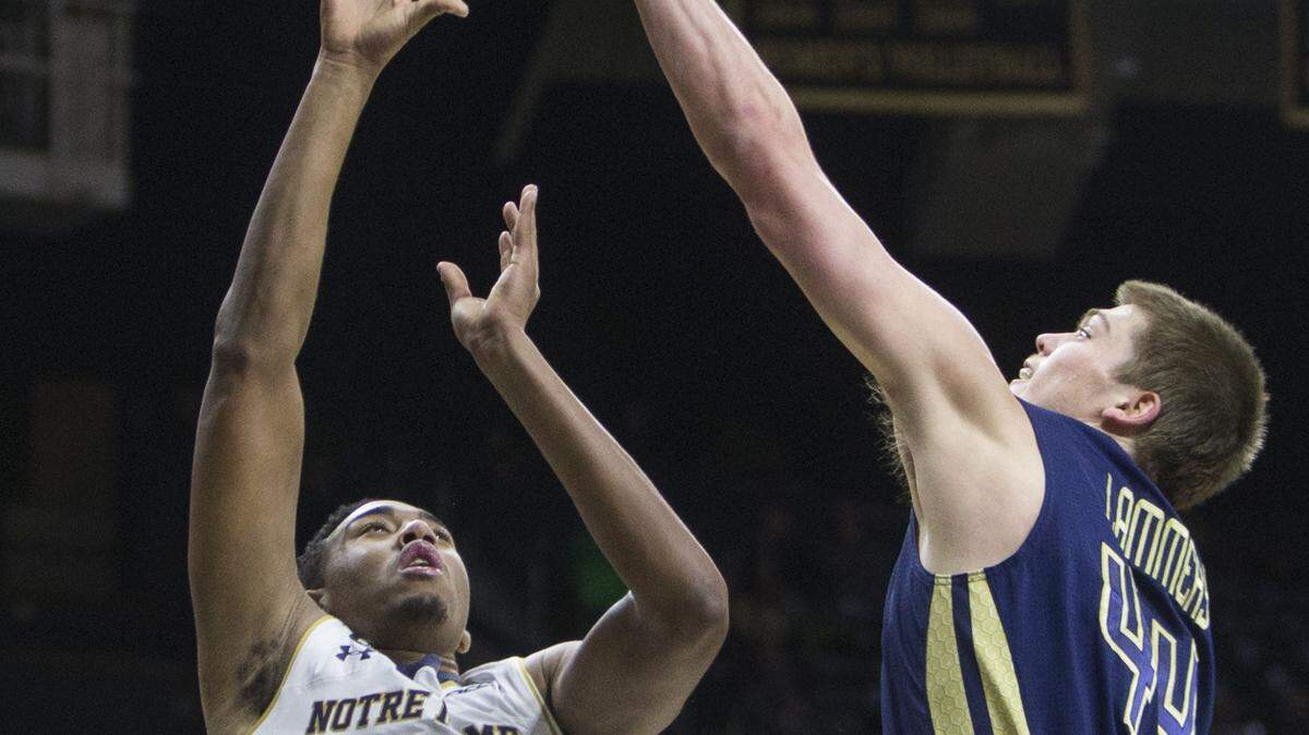 Notre Dame's Bonzie Colson (35) has a shot blocked by Georgia Techís Ben Lammers (44) during the first half of an NCAA college basketball game, Wednesday, Jan. 13, 2016, in South Bend, Ind. (AP Photo/Robert Franklin)
