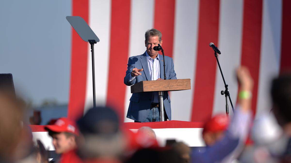 Georgia Governor Brian Kemp speaks to thousands of President Donald Trump supporters prior to Trump speaking at a ÒMake America Great AgainÓ rally at the Middle Georgia Regional Airport in Macon, GA Friday evening.
