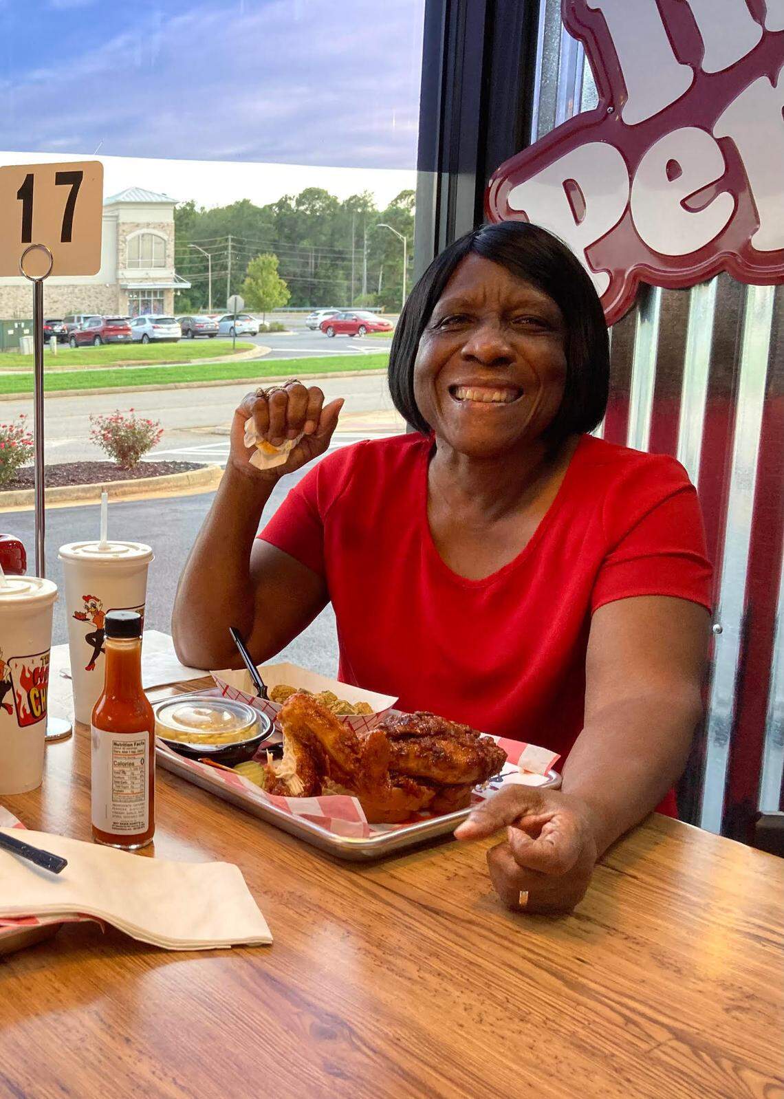 Willie Mae Respress enjoys a fried chicken plate at The Hot Chik in Warner Robins.