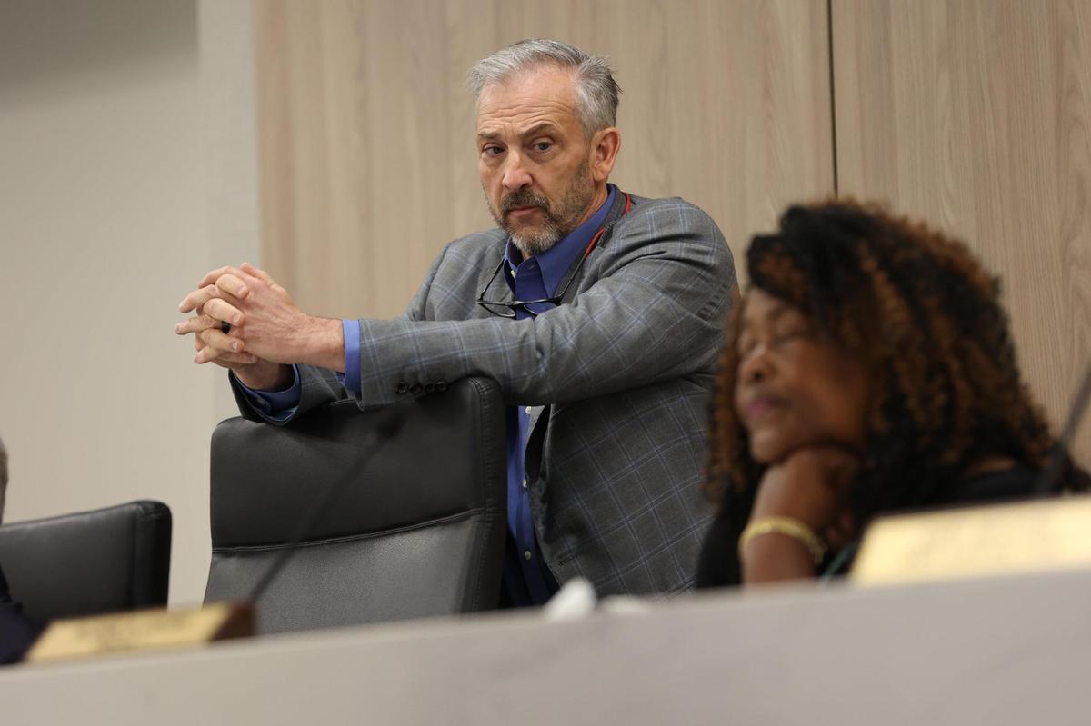 Macon Water Authority District 3 board member Dwight Jones looks at fellow MWA board member Elaine Lucas during a special meeting called by MWA chairman Gary Bechtel on Thursday, April 17, 2025, at the Macon Water Authority building in Macon, Georgia. Lucas accused other Macon Water Authority members of misusing purchase cards and taking racist actions against her and the only other Black board member Desmond Brown since she was elected to the board this year.