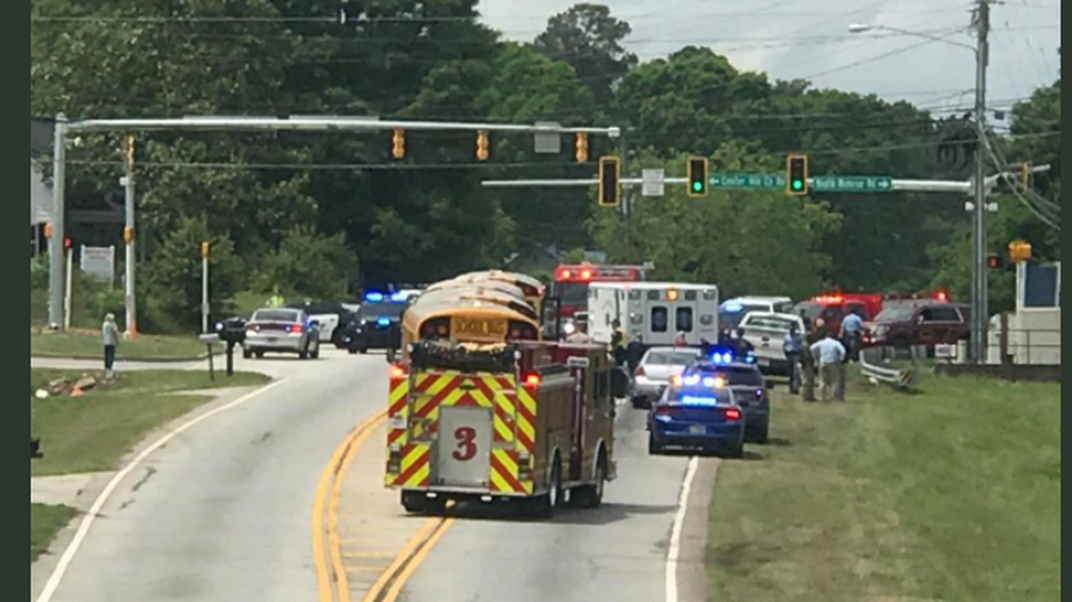 An 11-year-old student jumped from a school bus onto a passing truck.