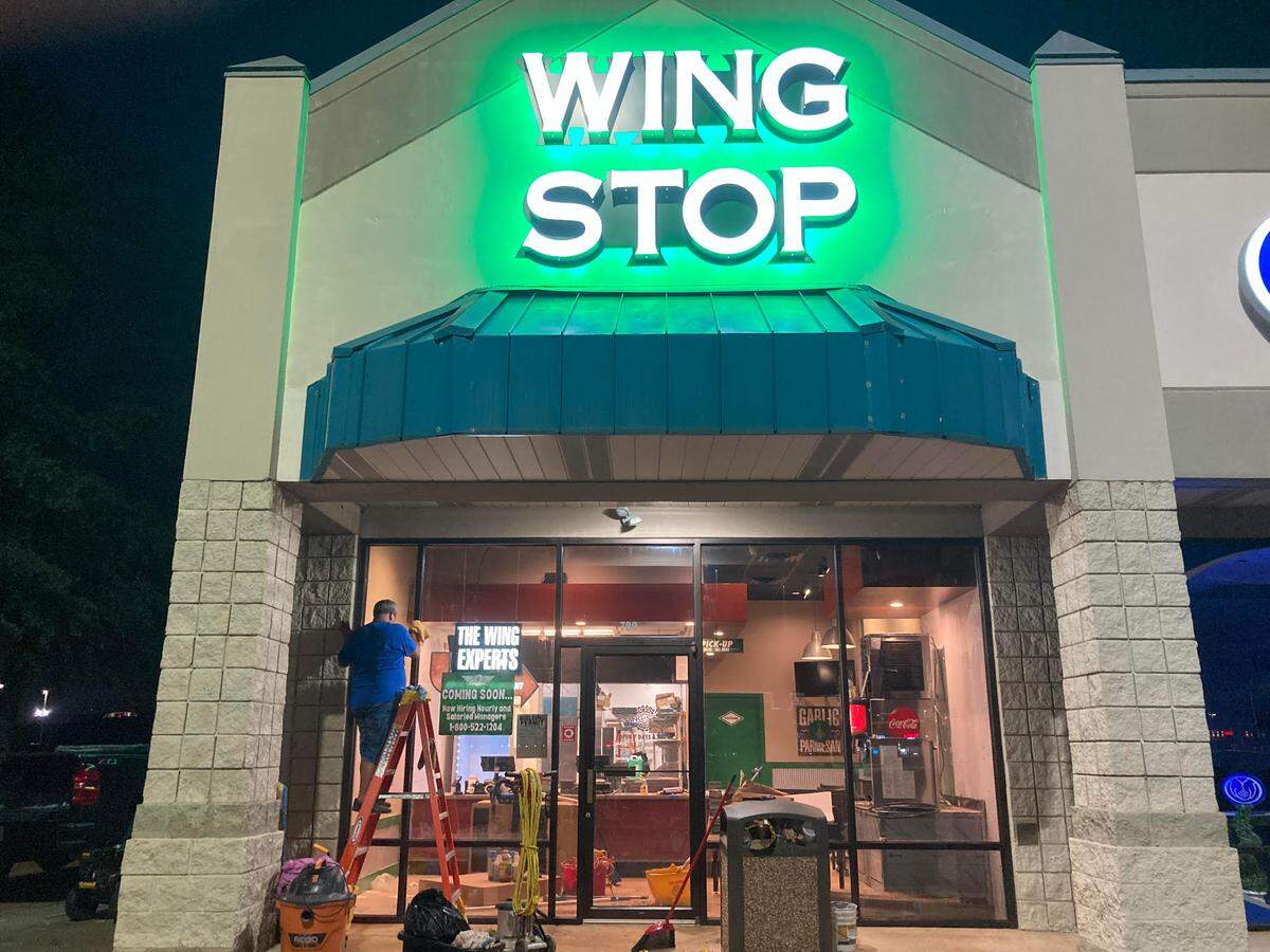 The sign is up and workers were busy on the remodel Thursday night for a new Wingstop opening soon at 789 Ga. 96, Suite 1A, in the Bonaire community of Warner Robins.