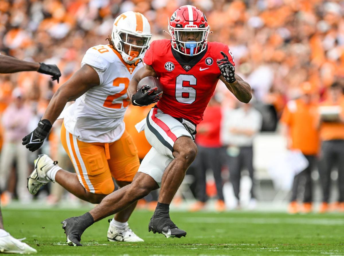 Georgia running back Kenny McIntosh heads for a Georgia first down in first half action Saturday in Athens.