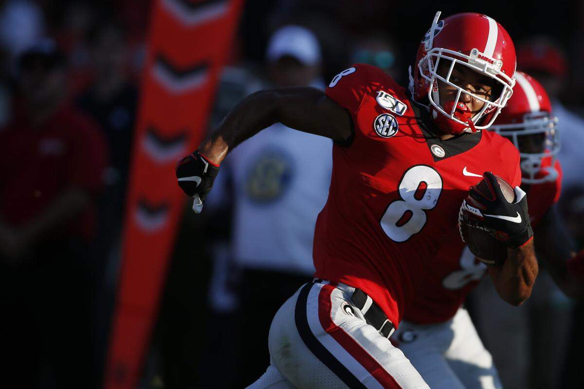 Georgia wide receiver Dominick Blaylock (8) drives into the end zone for a touchdown against Murray State in the second half of an NCAA college football game Saturday, Sept. 7, 2019, in Athens, Ga.