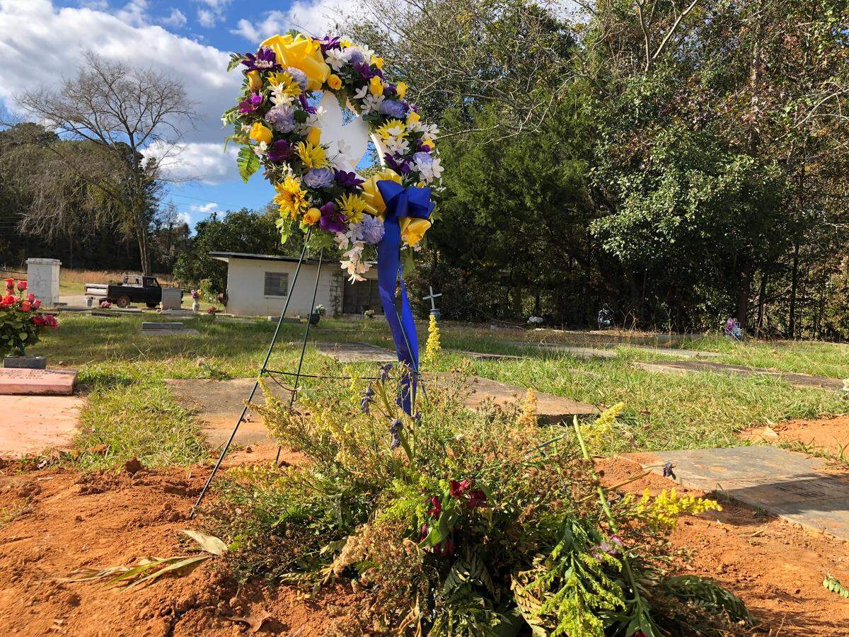 The grave of Milton D. Sanford Jr. in east Macon’s Woodlawn Memorial Park a week after his burial in mid-November.