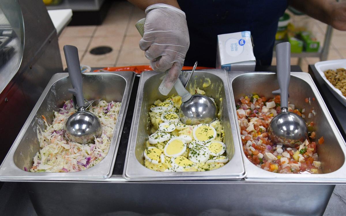 From left to right: Side dishes of coleslaw, potato salad and conch salad at Bahamas Caribbean Cuisine on Thursday, Aug. 15, 2024, in Warner Robins. The new restaurant serves authentic Bahamian food.