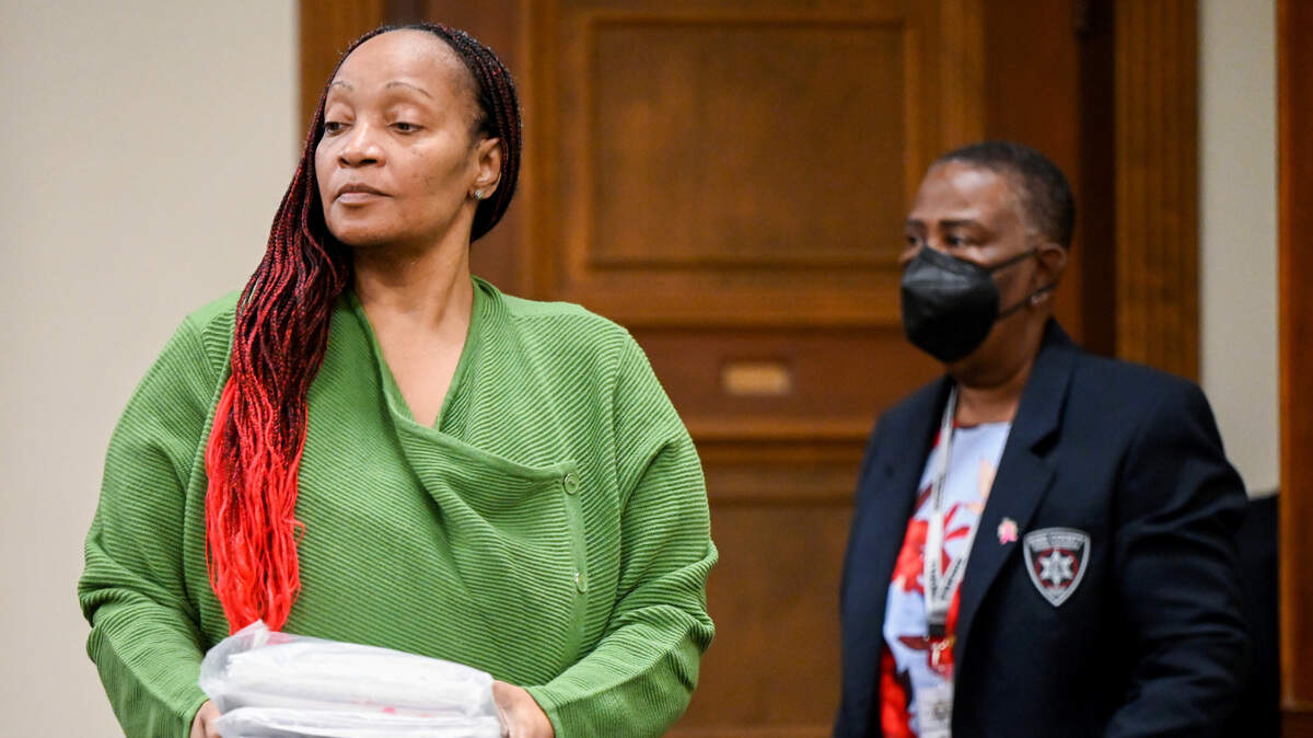 Donna Elyse Jackson, left, walks into Bibb County Superior Court Monday for jury selection in her murder trial. Jackson is accused of shooting her boyfriend to death during a confrontation in their Macon home seven years ago.