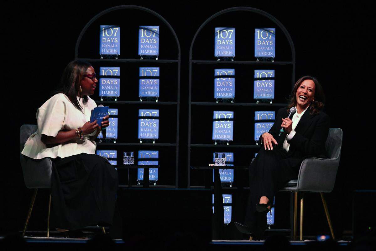 Former vice president Kamala Harris (right) speaks to the crowd while moderator and chef Mashama Bailey (left) during her book tour stop on Wednesday, Feb. 11, 2026, at the Macon City Auditorium in Macon, Georgia. Harris stopped in Macon on her national book tour “107 Days,” which details her 2024 campaign for president.