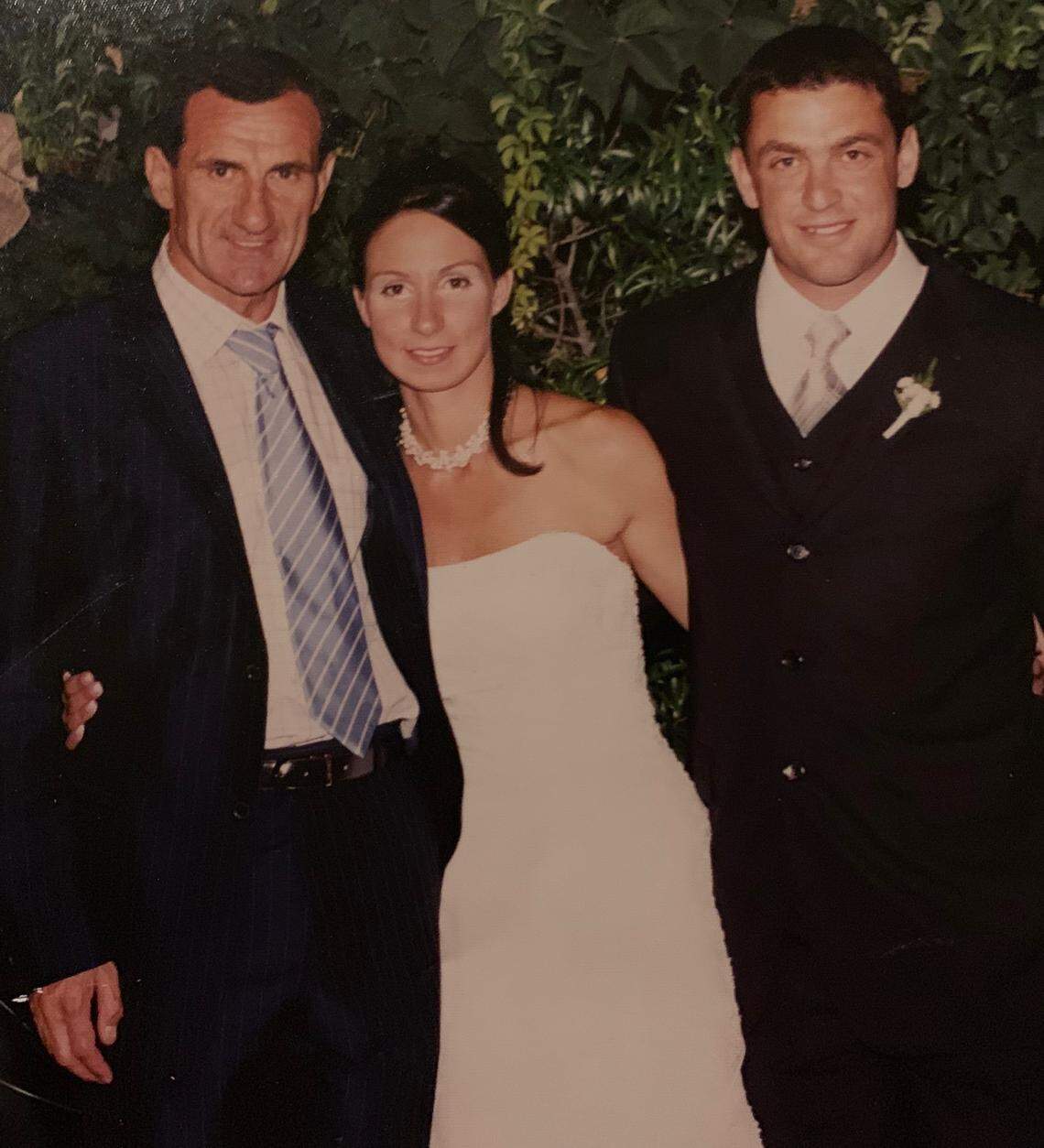 University of Georgia track coach Petros Kyprianou (right) is riding a motorcycle from Athens, Georgia, to Santa Monica, California, in an effort to raise money for childhood cancer. He lost his father-in-law, Dusan Mitosevic (right), to stomach cancer in January 2018.