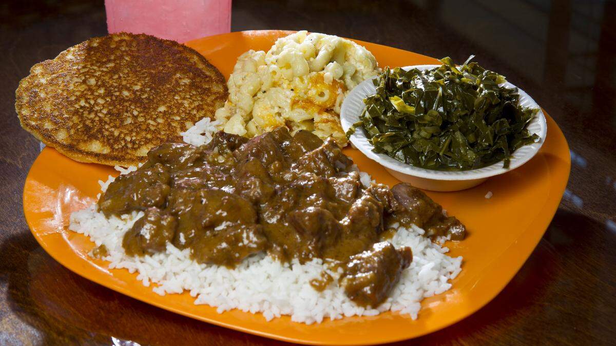 WOODY MARSHALL/THE TELEGRAPHBeef tips on rice, collards, macaroni and cheese and pink lemonade are among the menu possibilities at Milo and Ronda's Homestyle Cookin' in Macon.