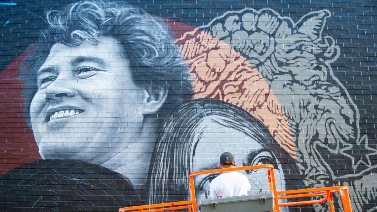 JASON VORHEES/THE TELEGRAPH Macon, GA, 07262020 Jeks, the artist who recently did a Little Richard mural at The Society Garden is currently painting a mural depicting Duane and Gregg Allman and Phil Walden in an alley between the Lofts at Capricorn and Mercer Music at Capricorn studio.