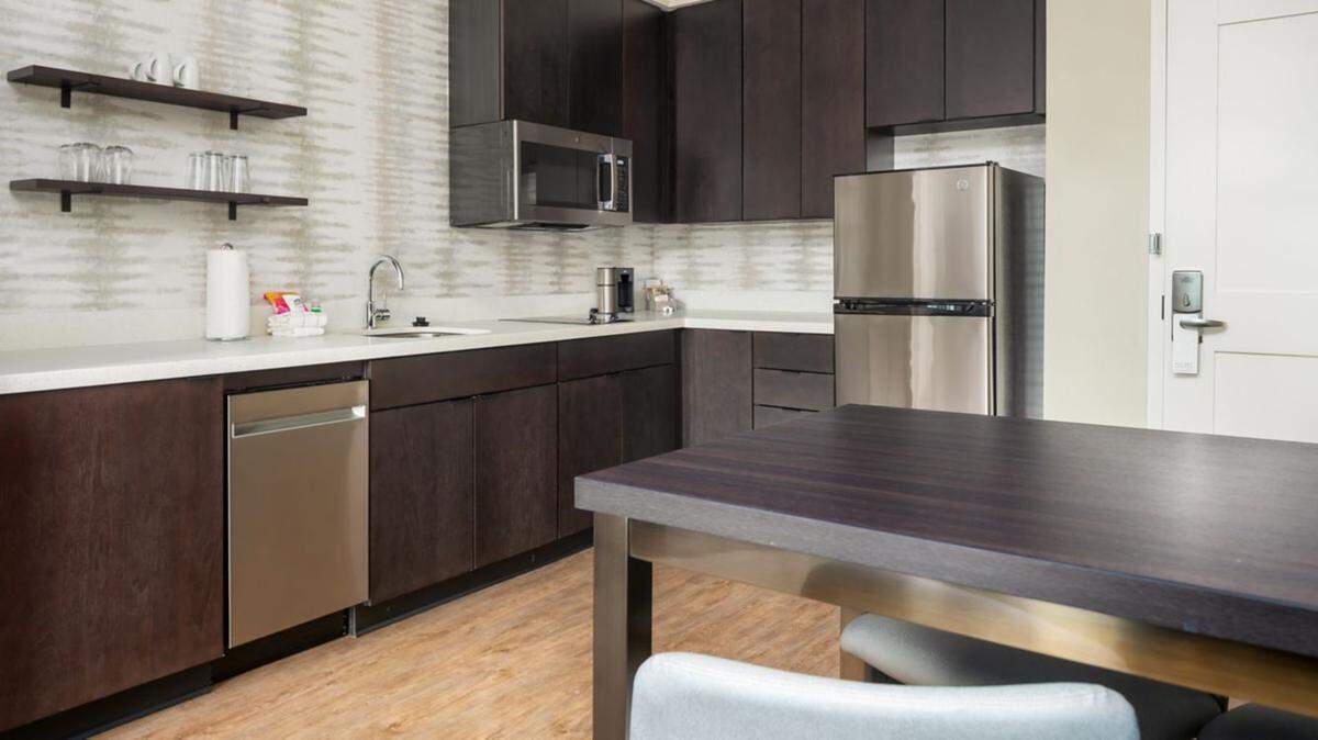 The kitchenette of a one bedroom suite at a Residence Inn by Marriott in Decatur that also includes a living room and two queen beds. The rooms at a New Residence Inn by Marriott in Warner Robins now under construction are expected to be similar, according the developer.