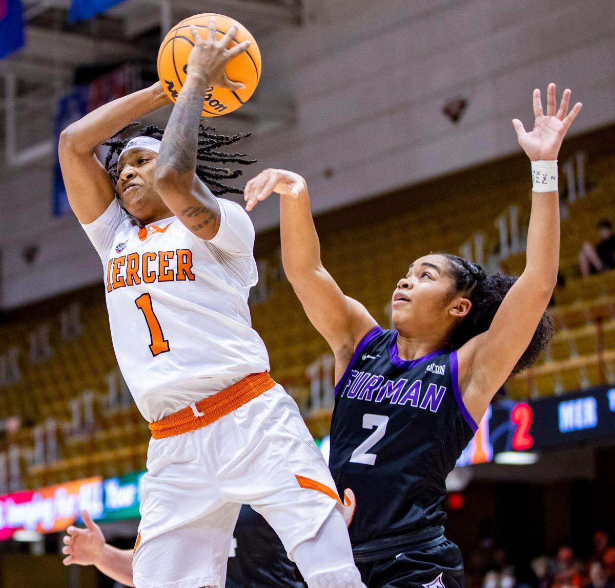 Mercer senior guard Amoria Neal-Tysor drives to the net against Furman Saturday afternoon in the SoCon Ingles Basketball Championships at the Harrah’s Cherokee Center in Asheville, N.C.