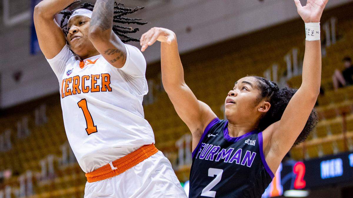 Mercer senior guard Amoria Neal-Tysor drives to the net against Furman Saturday afternoon in the SoCon Ingles Basketball Championships at the Harrah’s Cherokee Center in Asheville, N.C.
