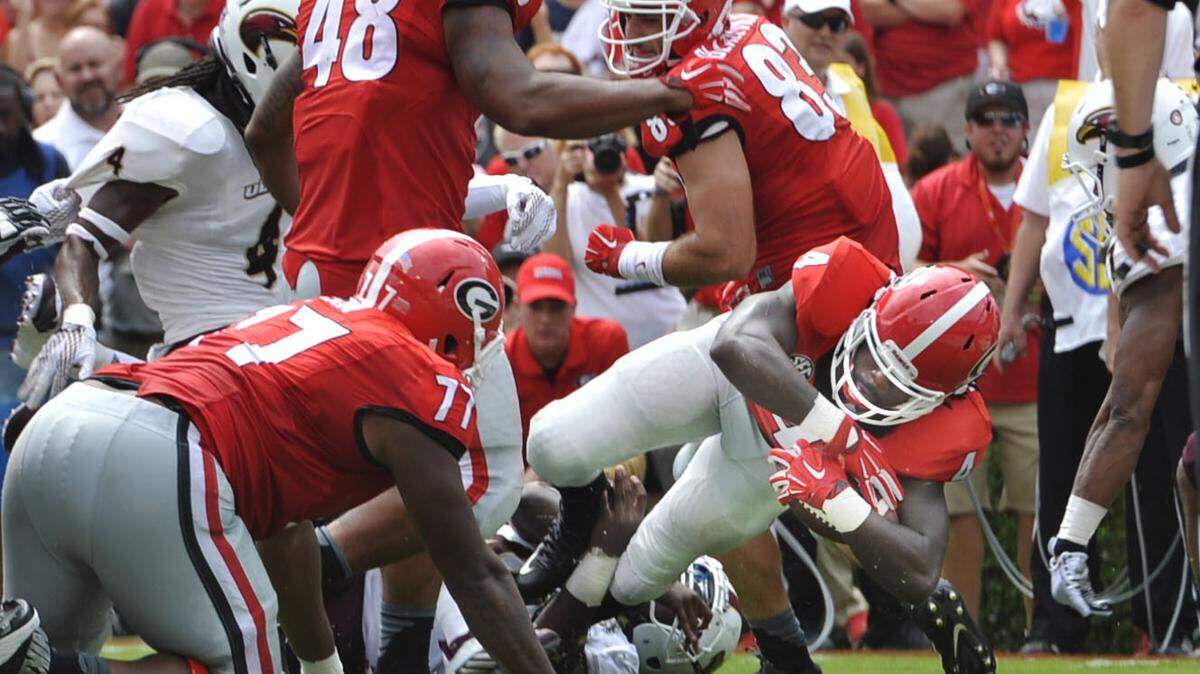 Georgia running back Keith Marshall (4) makes his way into the end zone on a 3-yard run in the second quarter Saturday to give the Bulldogs a 21-0 lead over Louisiana-Monroe.