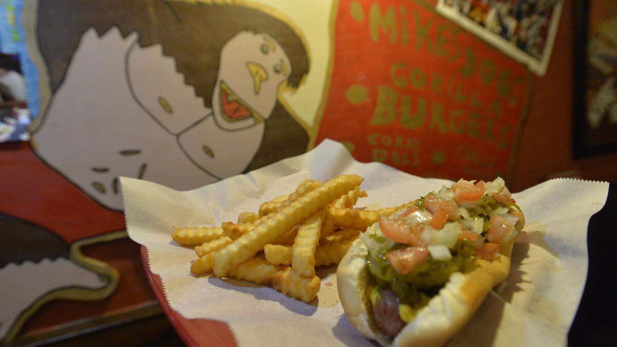 Among the menu items at Mike's Hotdogs & Hamburgers are a Chicago style dog and fries.