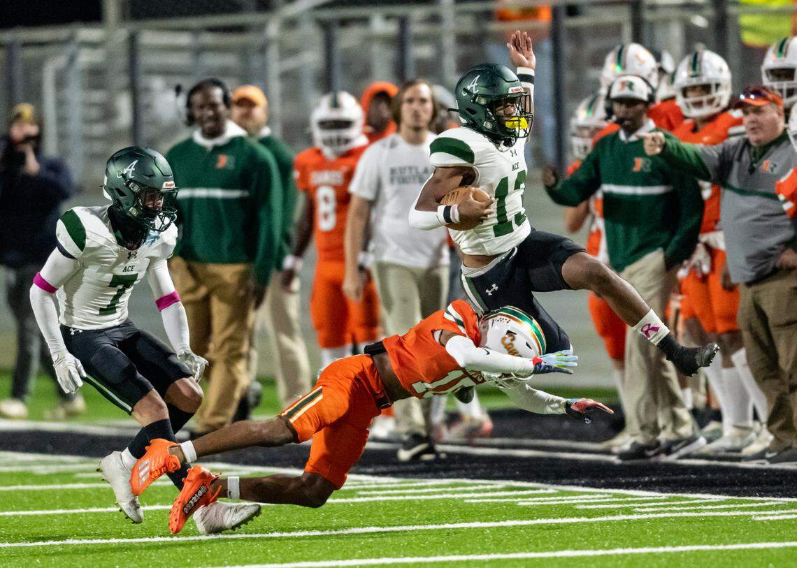 ACE running back Aaron Davis (13) is tripped up along the sideline during the Gryphons’ 44-30 win over Rutland Friday night.