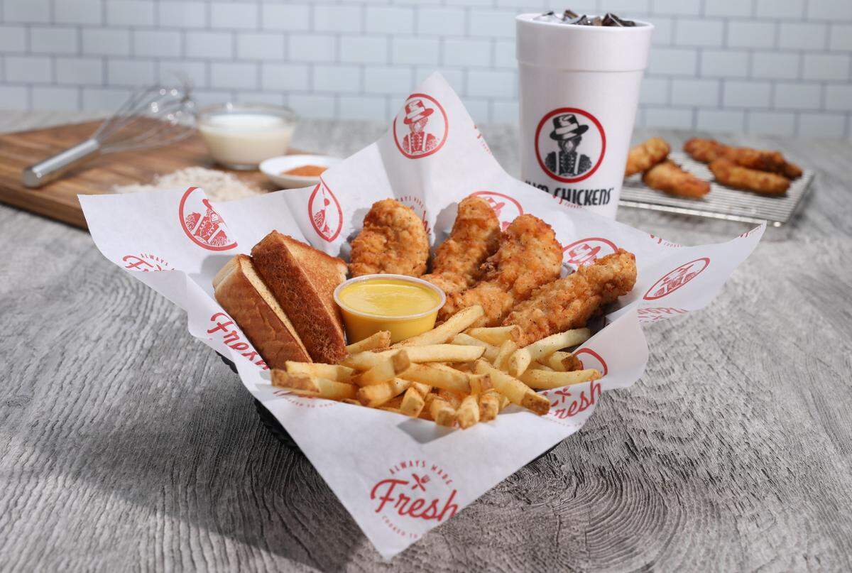 Fried chicken tenders, fries and a drink from Slim Chickens.