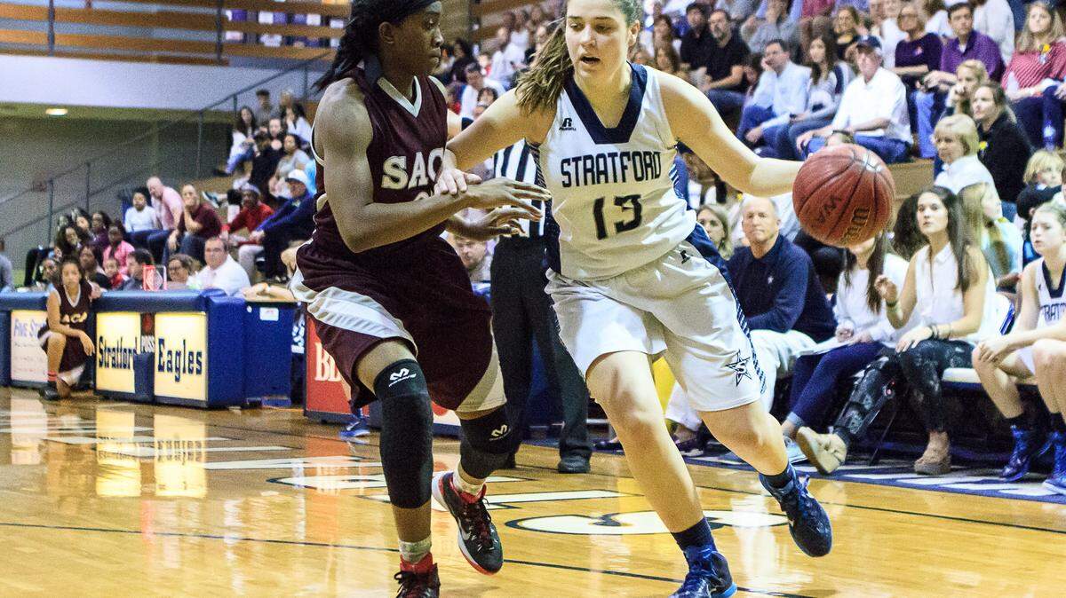 Stratford's Carey Woodcock (13) drives to the basket against Southwest Atlanta Christian in the first round of the GHSA Class A Private School Tournament on Saturday.
